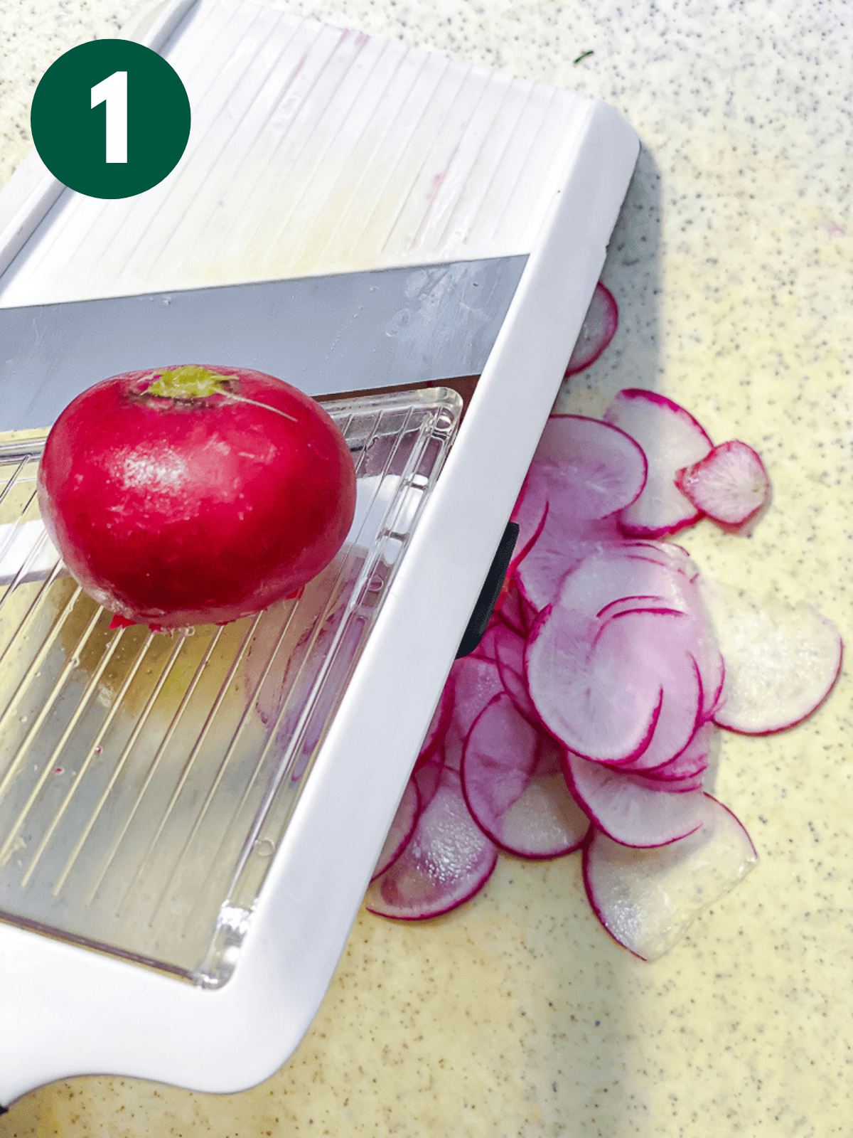 process shot showing radishes being sliced