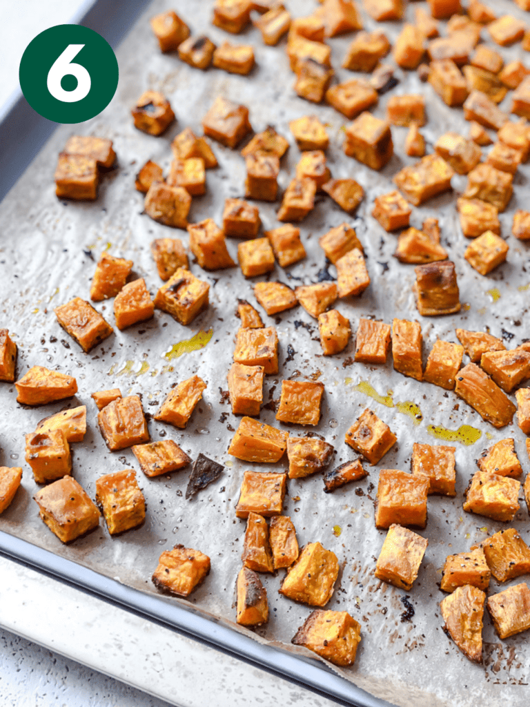 process shot showing bakedsweet potatoes on baking tray