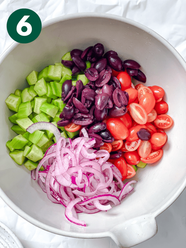 process shot showing veggies in bowl