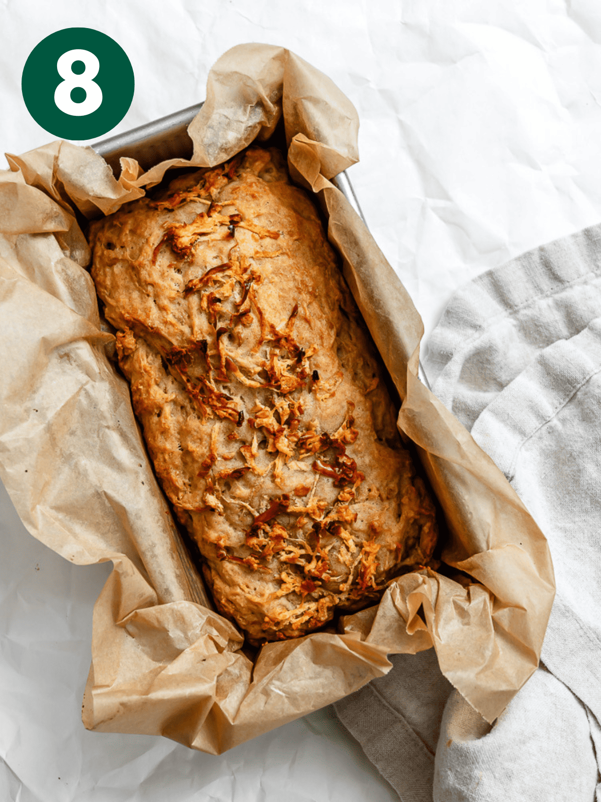 baked vegan Apple Cinnamon Bread in a loaf pan.