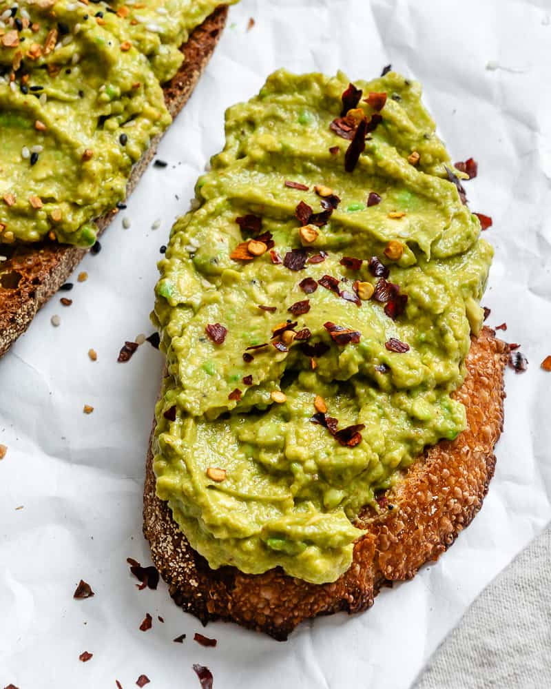 completed Best Vegan Avocado Toast on white surface