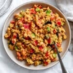 vegan garbanzo bean salad in a large white bowl.