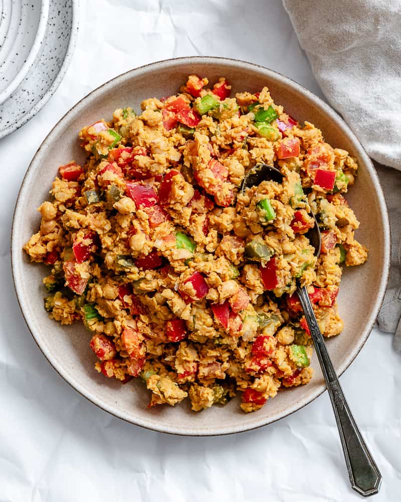 vegan garbanzo bean salad in a large white bowl.