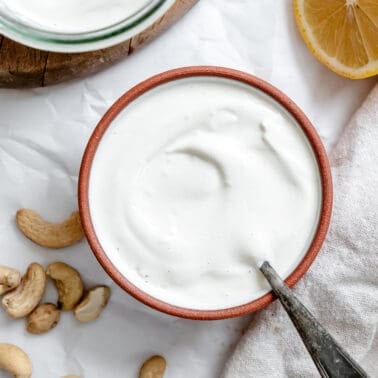 creamy white cashew cream in a small bowl.