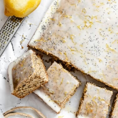 overhead view of a sliced lemon poppy seed cake.