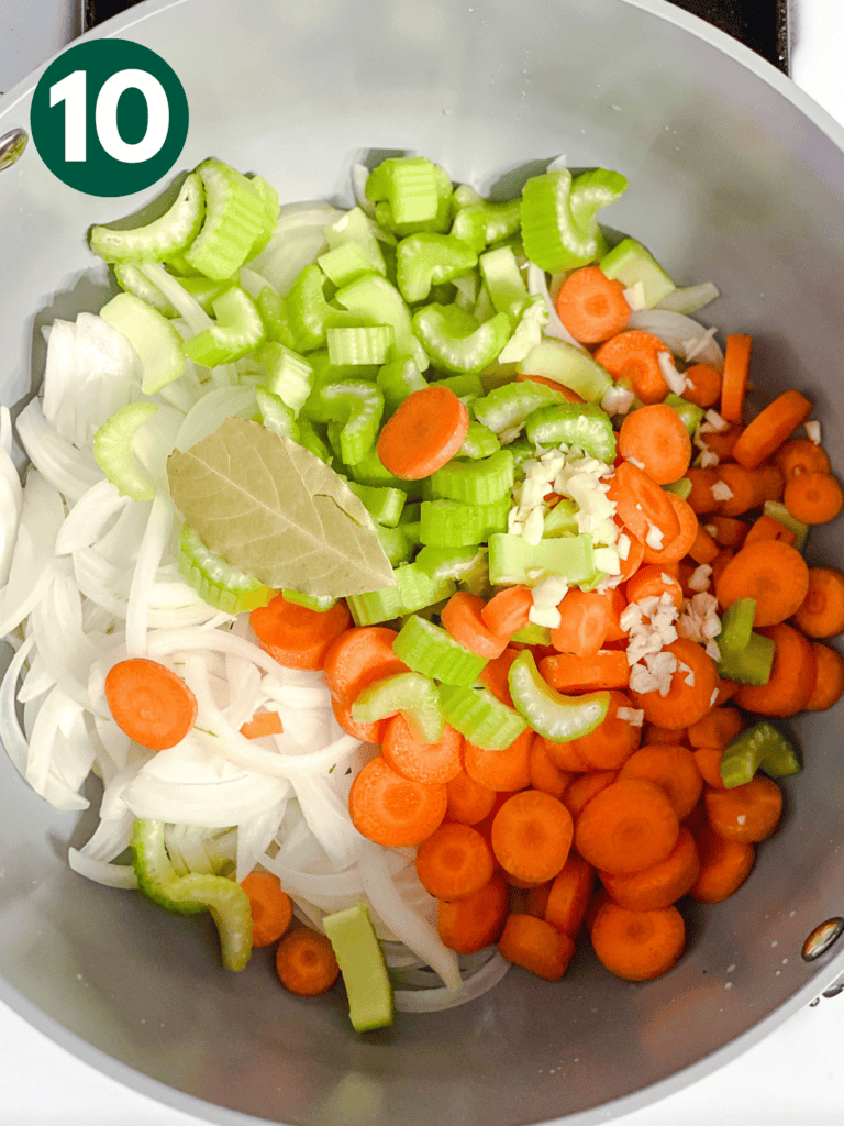 process shot showing veggies cooking in pot