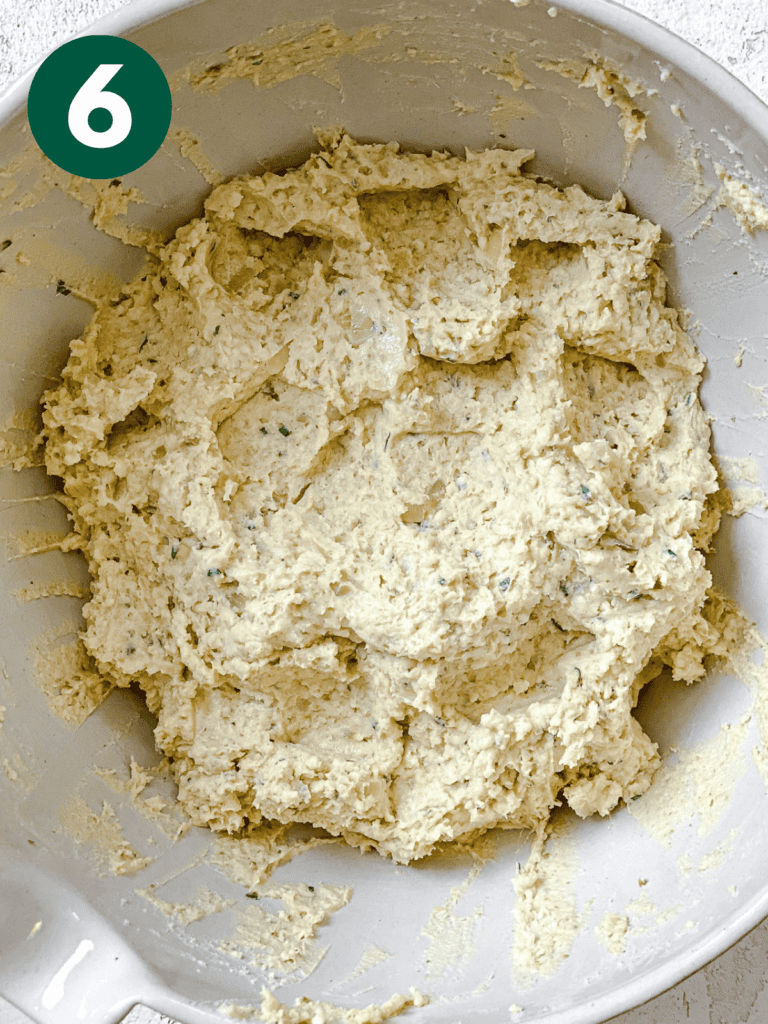 process shot showing dough formed in bowl