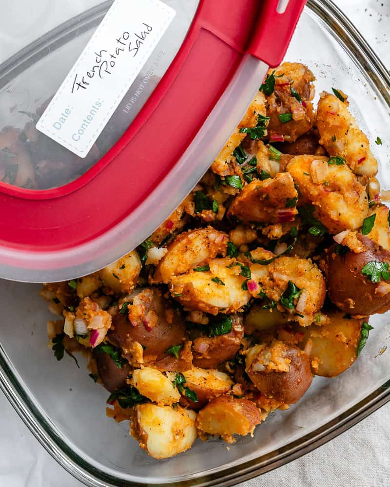 french potato salad in a storage container.