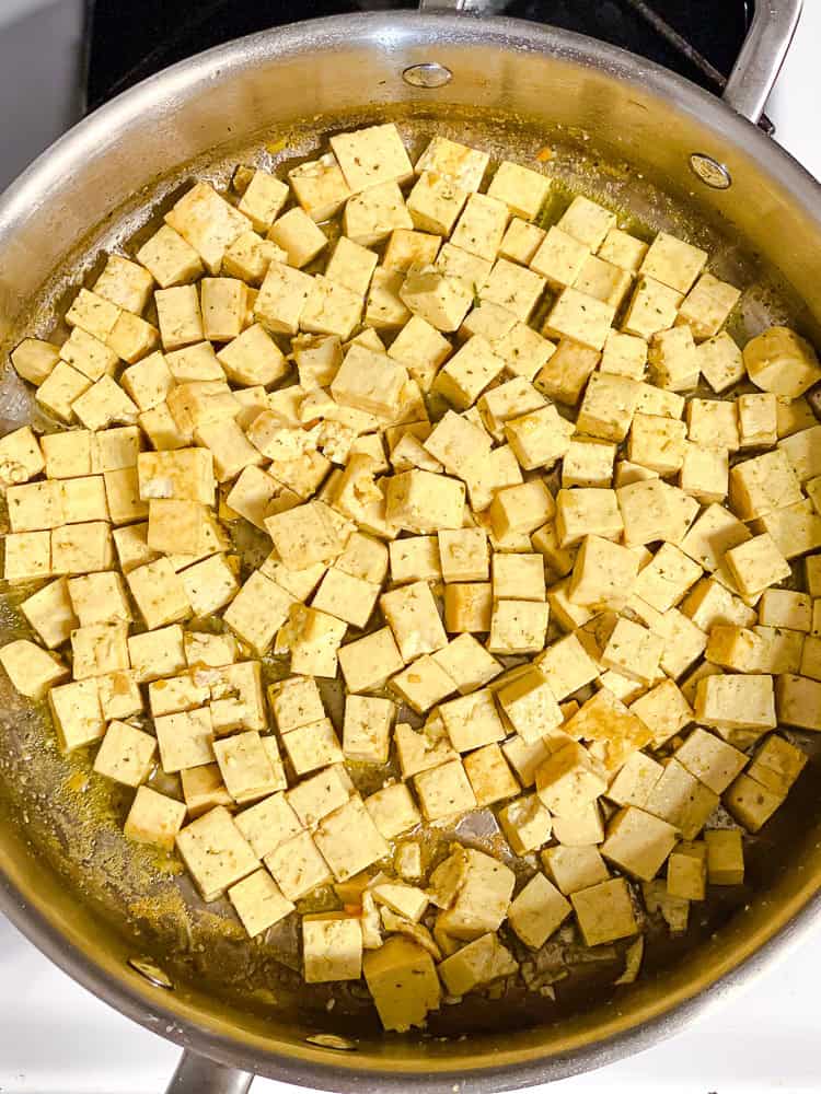 process shot showing tofu in pan