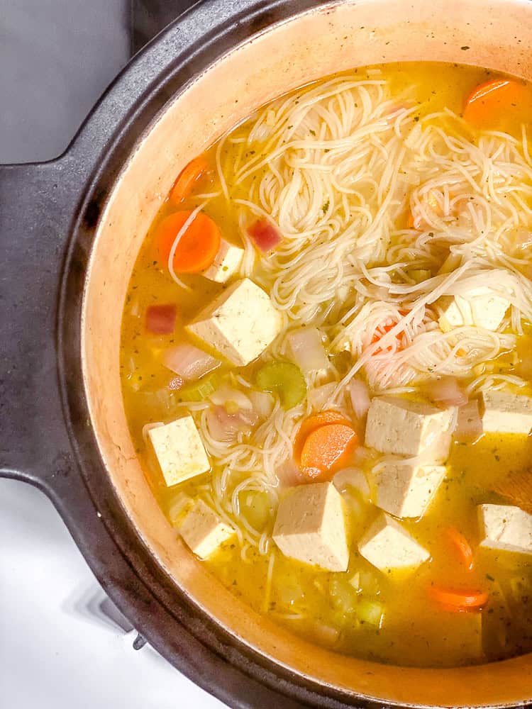 process shot of ingredients cooking in pot