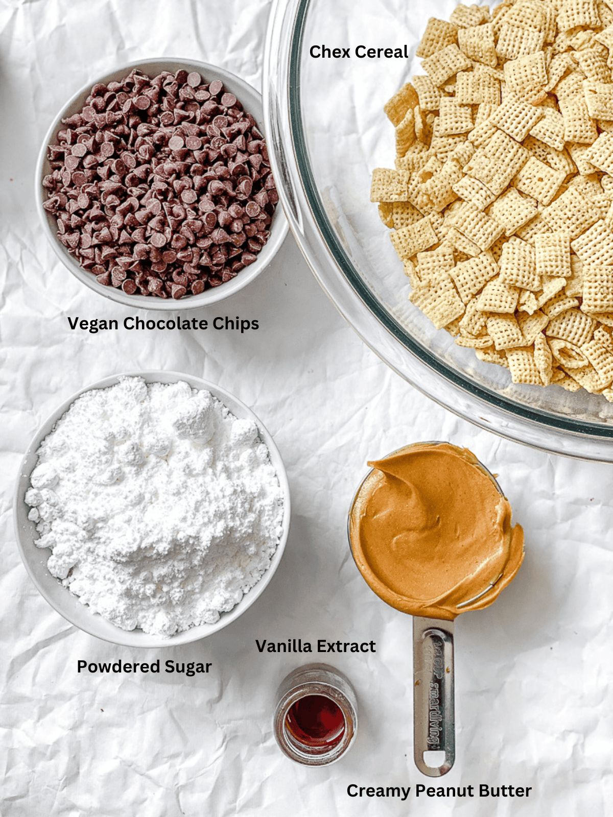 ingredients for Easy Muddy Buddies [Puppy Chow] on a white surface